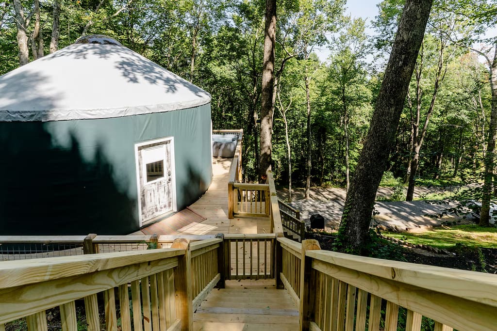 Yurts in NC With Hot Tub: Windsong Guest Yurt Topton