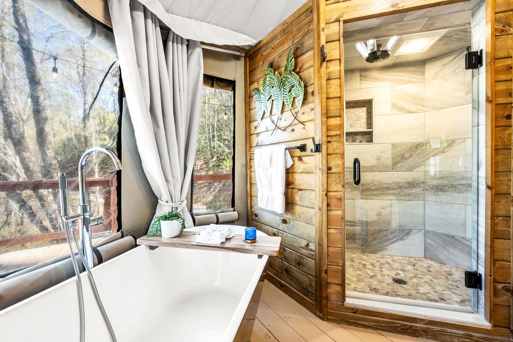 Indoor soaking tub inside a luxury safari tent at Elk Hollow Resort